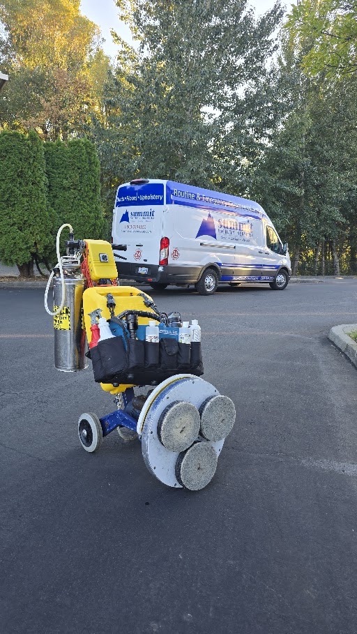 Summit facility services carpet cleaning equipment staged next to the service van