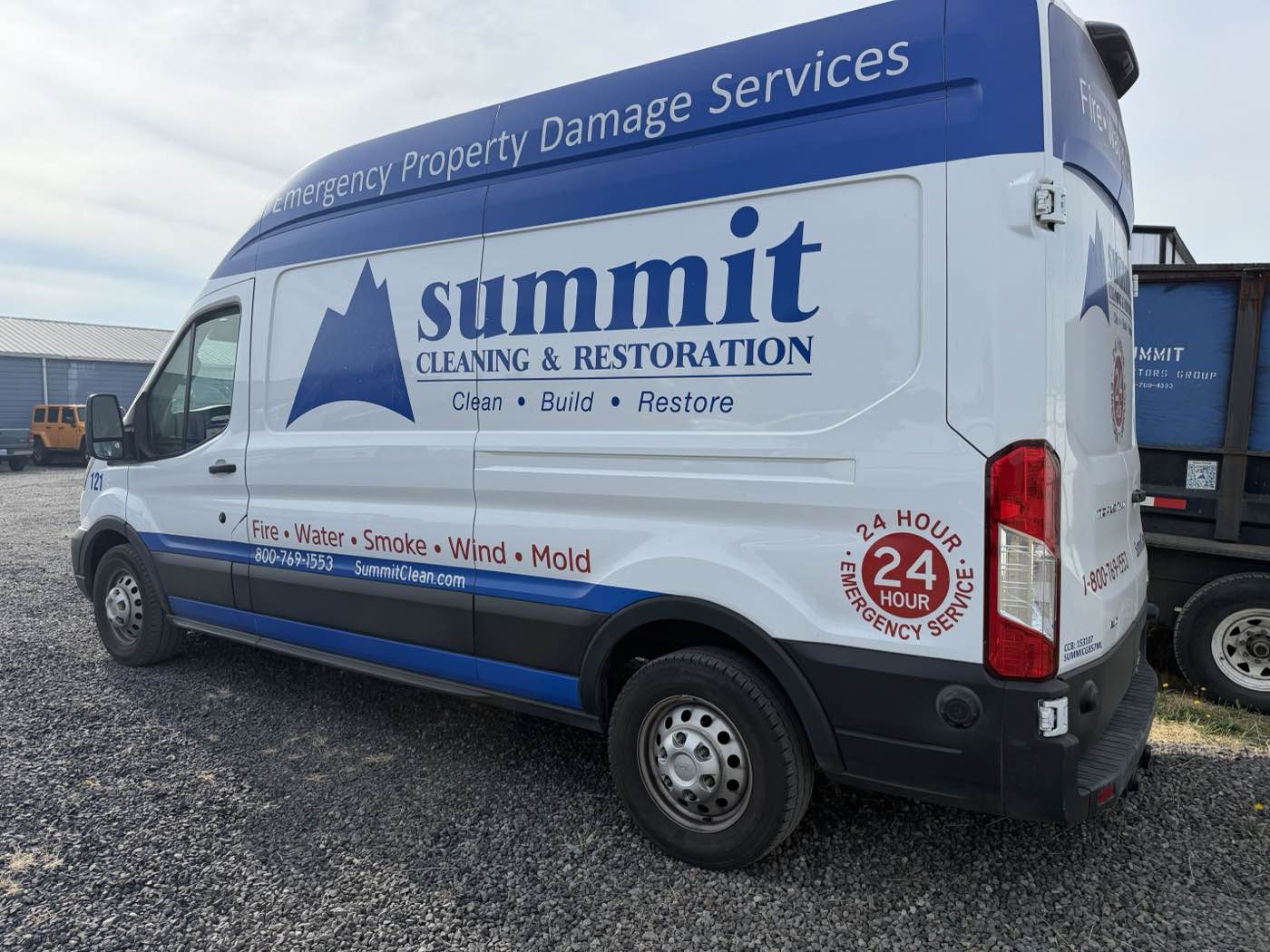 Summit Cleaning & Restoration branded response van, 24-hour emergency service
